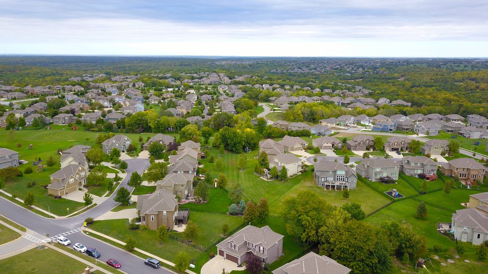 aerial photography of gray houses in lutz property investing
